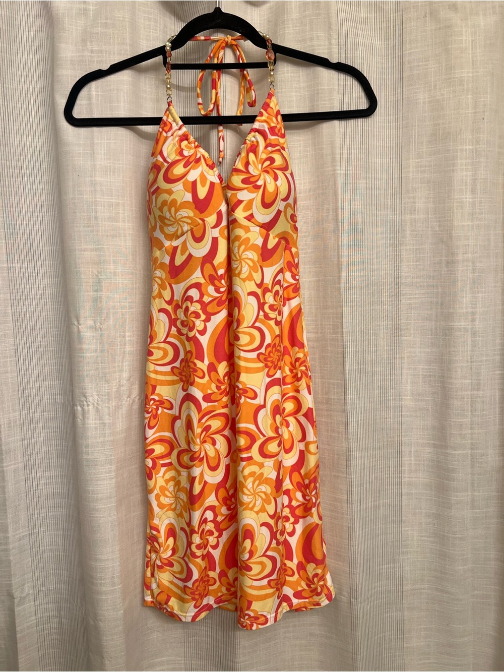 Brand new absolutely gorgeous floral dress with beaded straps that tie!